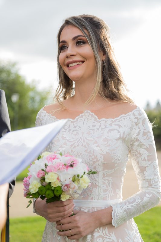 Bride smiling during her elopement ceremony - Paris Elopement and Destination Photographer